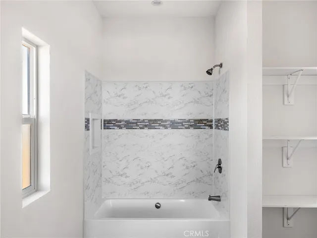 a close view of a bathtub in bathroom