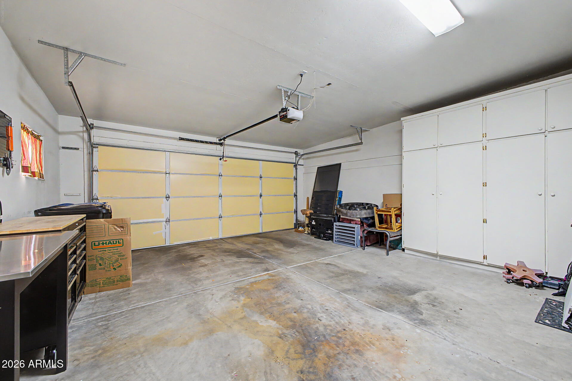 5445 East McKellips Road, Unit 21 Mesa, AZ 85215 - Photo 25 of 31 Cabinets at Garage