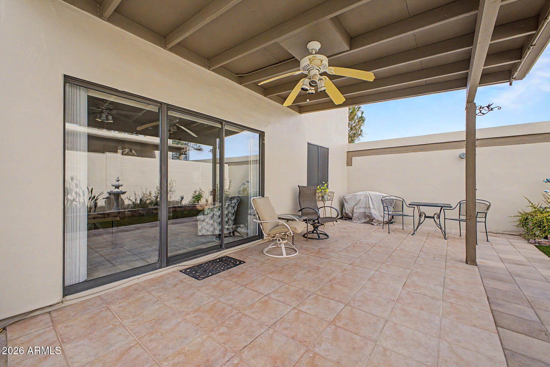 5445 East McKellips Road, Unit 21 Mesa, AZ 85215 - Photo 26 of 31 Extending pavers at covered Patio