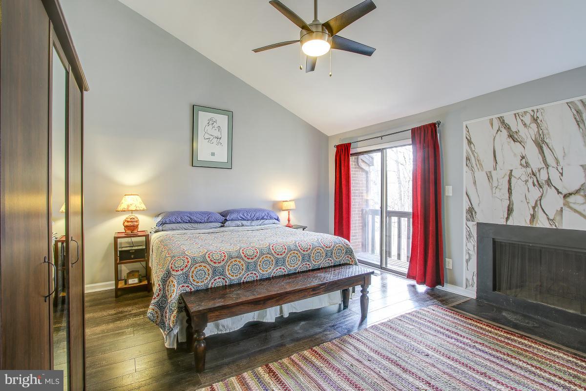 2218 Glencourse Lane Reston, VA 20191 - Photo 20 of 30 Master Bedroom w/ Fireplace & Deck!