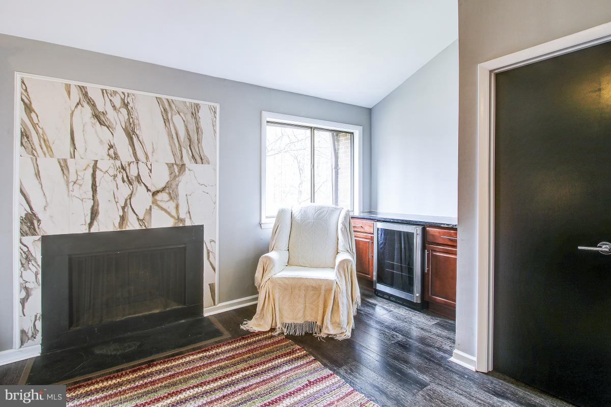 2218 Glencourse Lane Reston, VA 20191 - Photo 22 of 30 Fireplace & Wine Fridge in Master Bedroom
