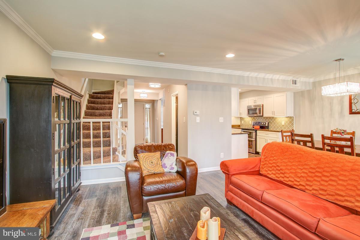2218 Glencourse Lane Reston, VA 20191 - Photo 4 of 30 Recessed lighting, crown molding, designer fixture