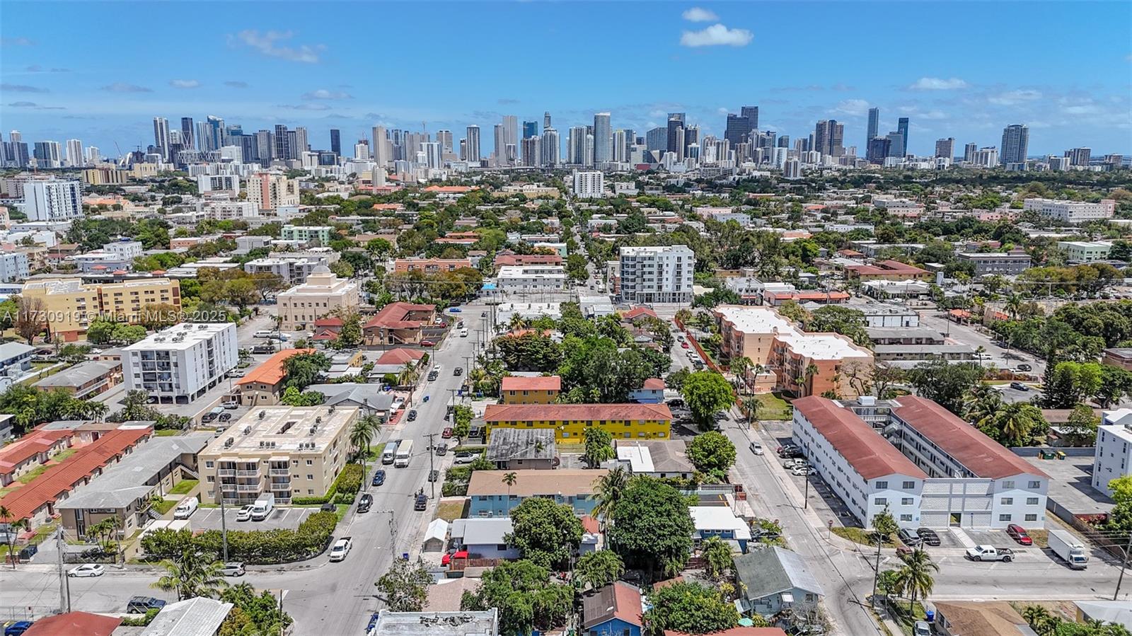 1800 Southwest 3rd Street, Unit C Miami, FL 33135 - Photo 3 of 10 an aerial view of a city with lots of residential buildings