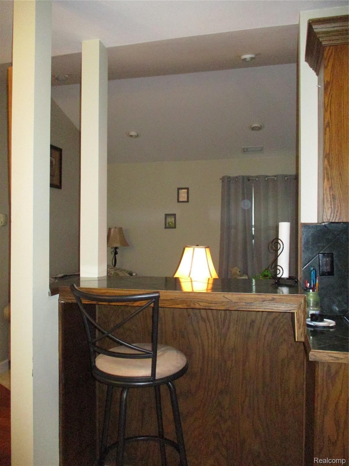 19215 Inkster Road Livonia, MI 48152 - Photo 11 of 43 KITCHEN SNACK AREA OVERLOOKS LIVING ROOM