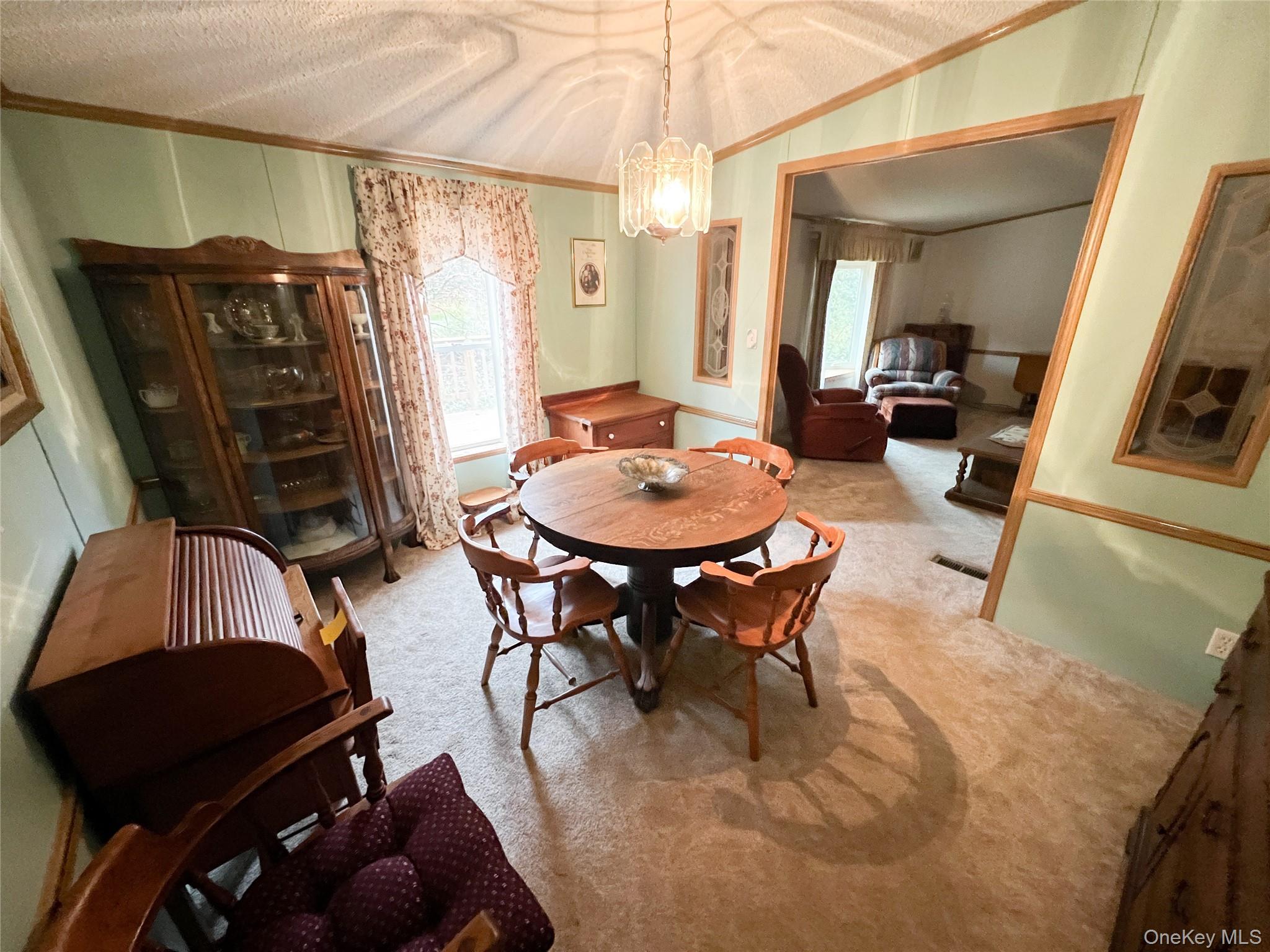 509 Burnwood Road East Branch, NY 13756 - Photo 7 of 14 a dining room with furniture and window