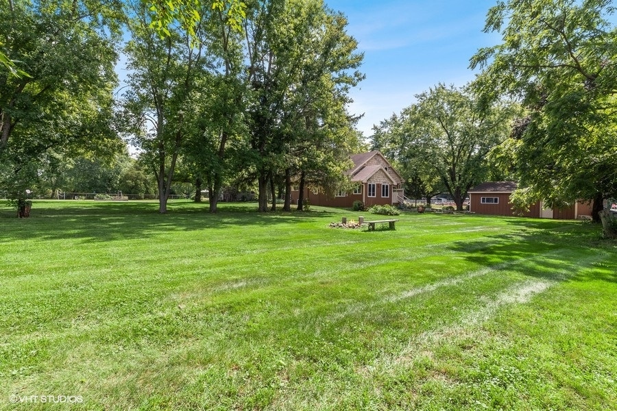 28W740 Army Trail Road West Chicago, IL 60185 - Photo 20 of 24 a view of a park with trees and grass