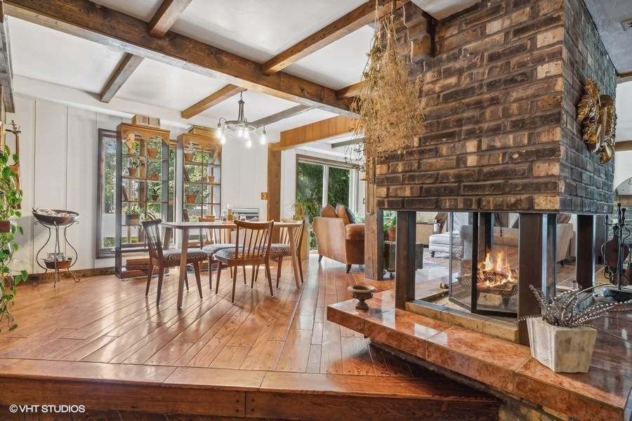 28W740 Army Trail Road West Chicago, IL 60185 - Photo 7 of 24 a view of dining room with wooden floor