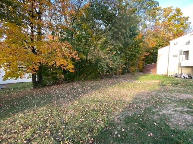 a picture of a wall with a white and white refrigerator