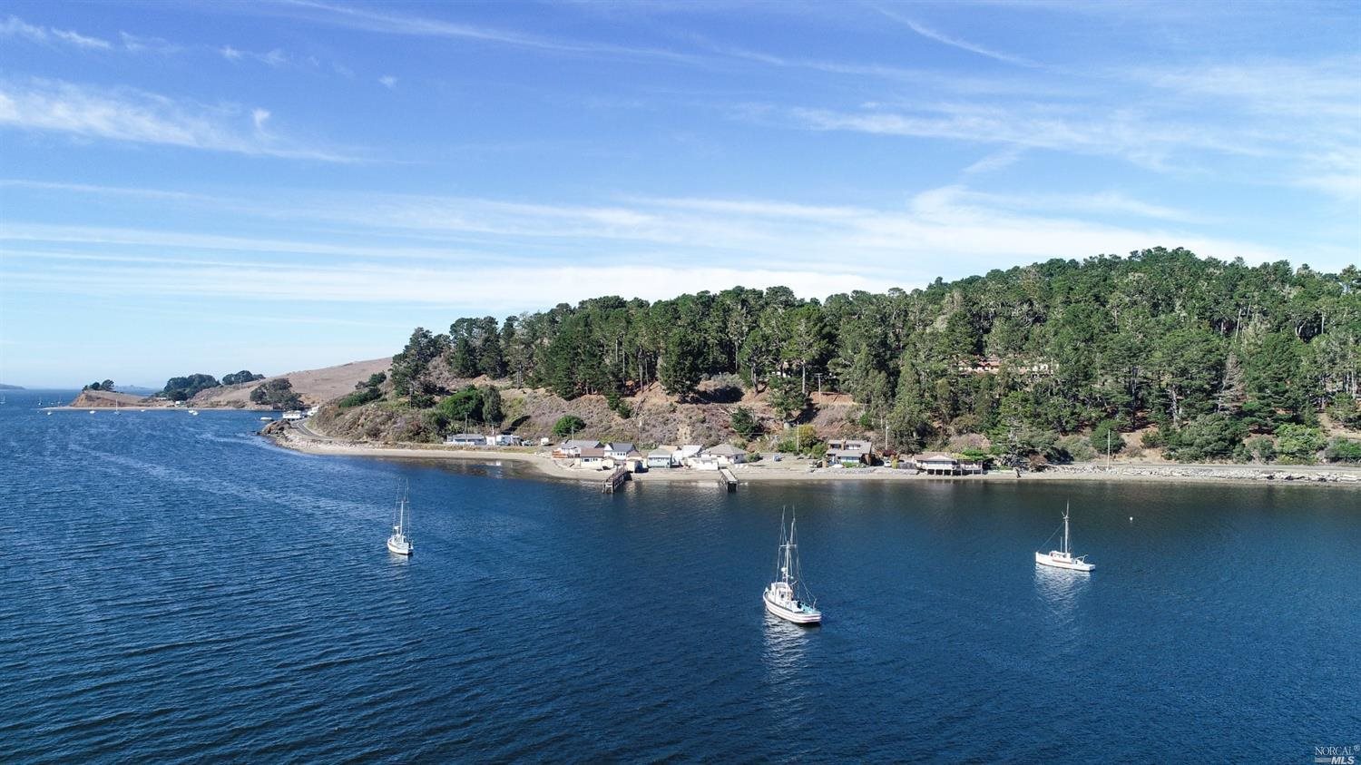 a view of a lake with mountain