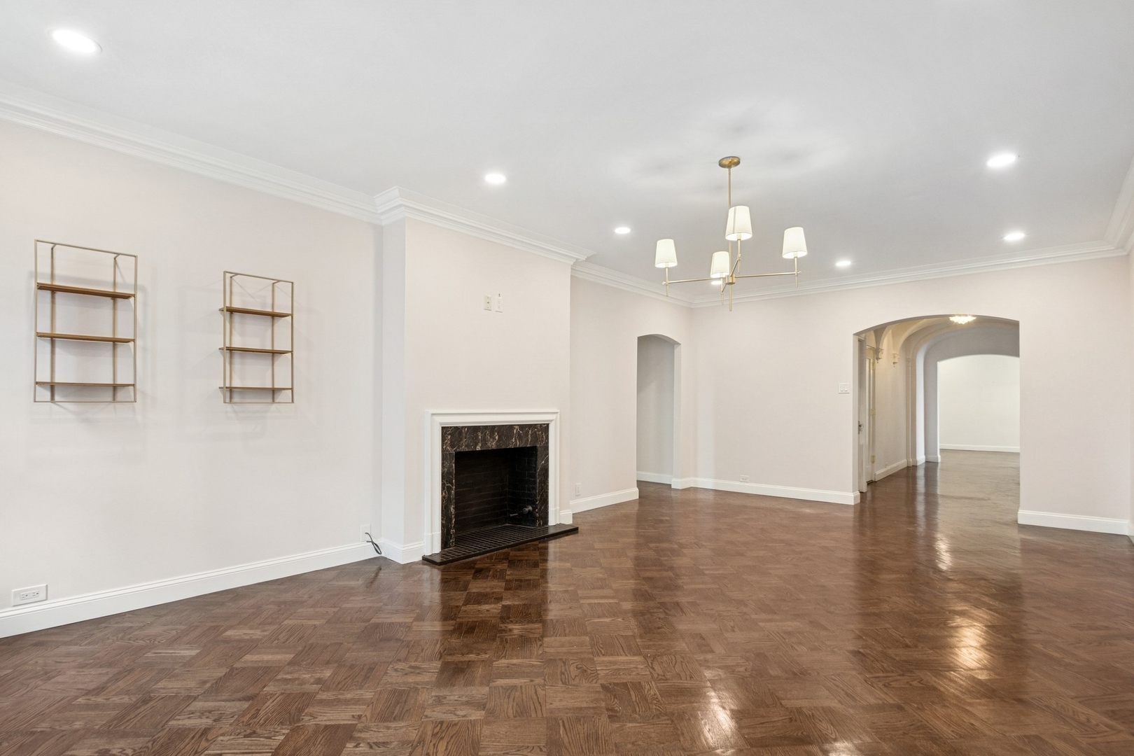 1640 East 50th Street, Unit 13B Chicago, IL 60615 - Photo 4 of 16 a view of an empty room with a kitchen