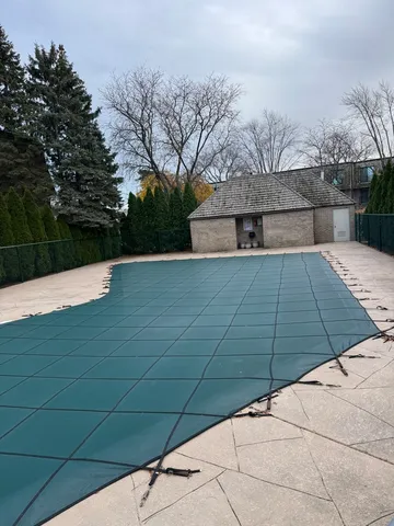 a view of backyard and entertaining space