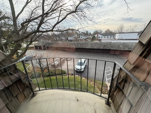 a view of a wooden fence