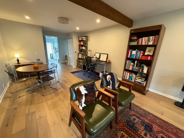 a living room with furniture and a table