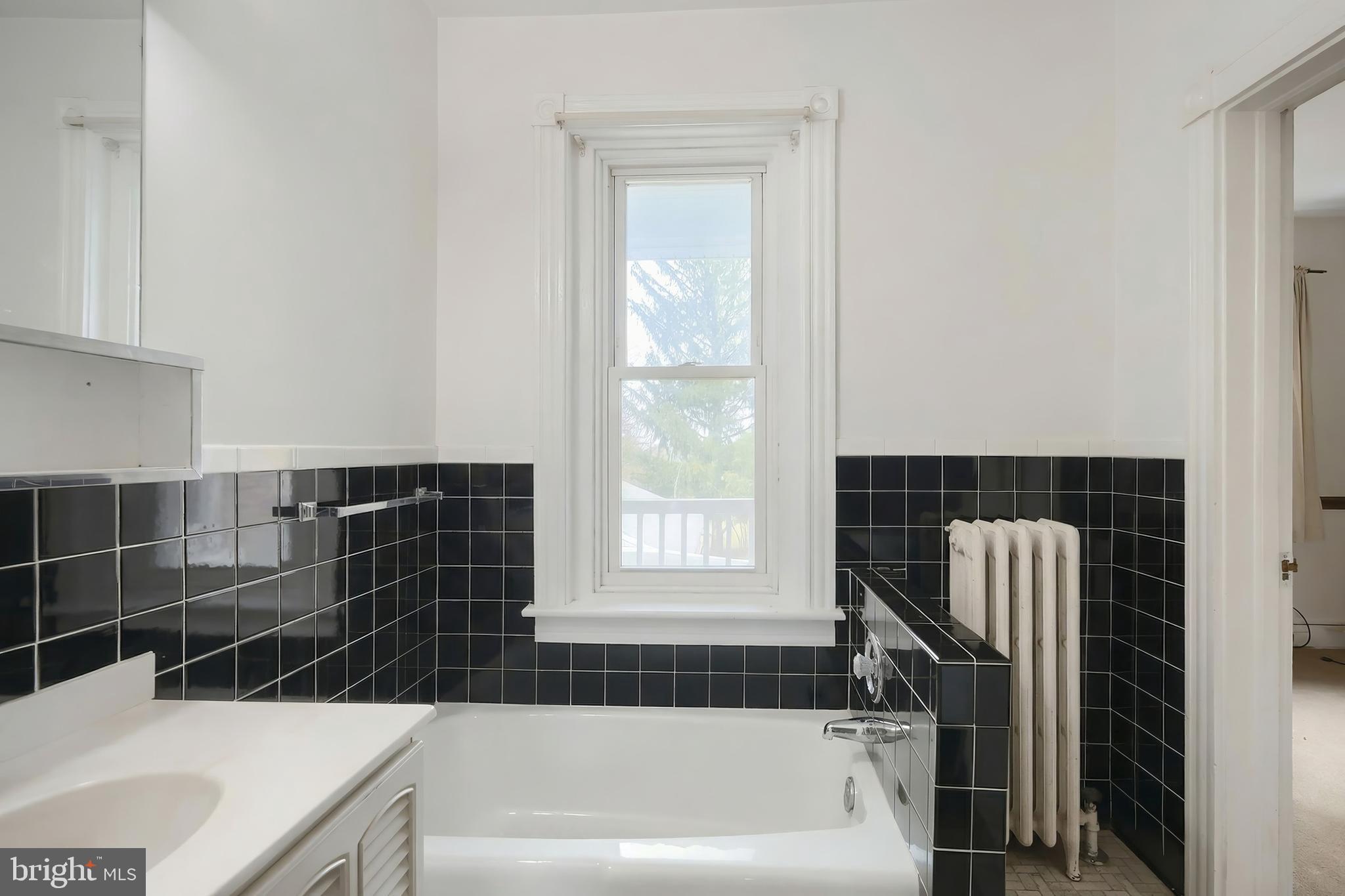 1545 Lititz Road Manheim, PA 17545 - Photo 43 of 66 a bathroom with a bathtub a window and a shower