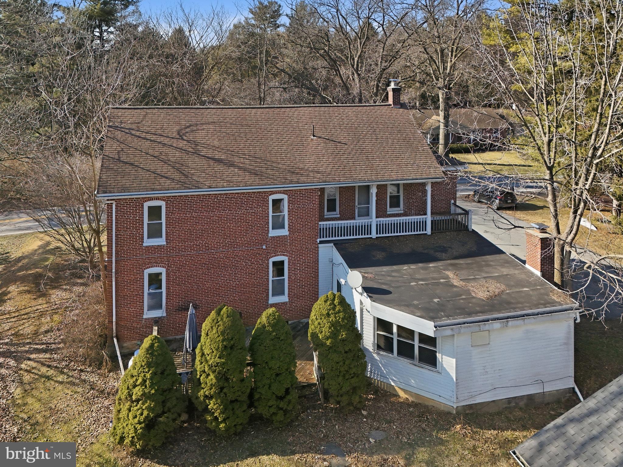 1545 Lititz Road Manheim, PA 17545 - Photo 52 of 66 a aerial view of a house with a yard and mountain view in the background