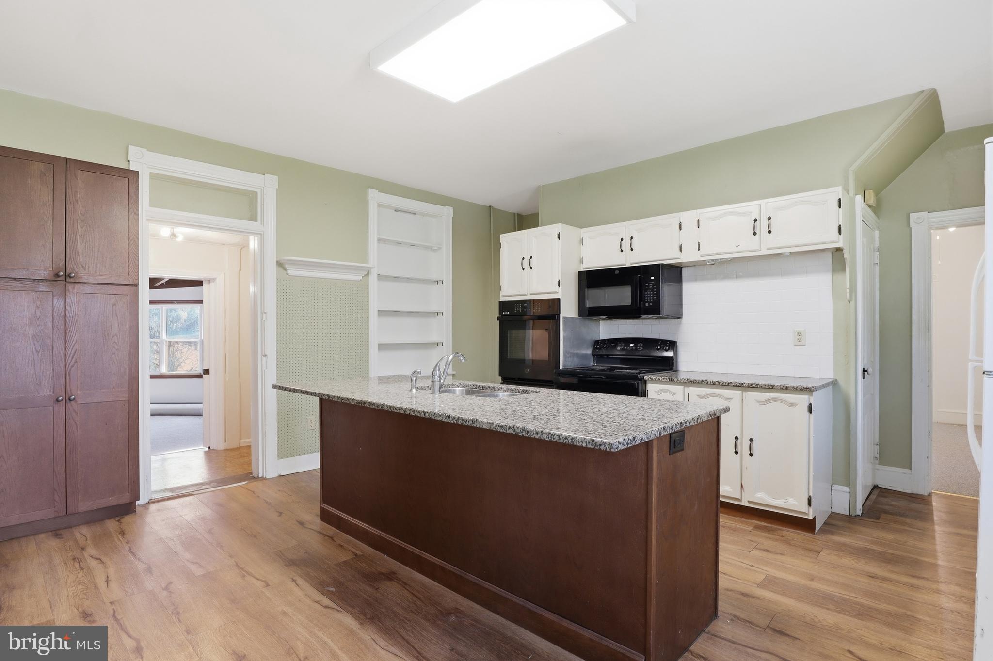 1545 Lititz Road Manheim, PA 17545 - Photo 6 of 66 a kitchen with stainless steel appliances a stove refrigerator and cabinets