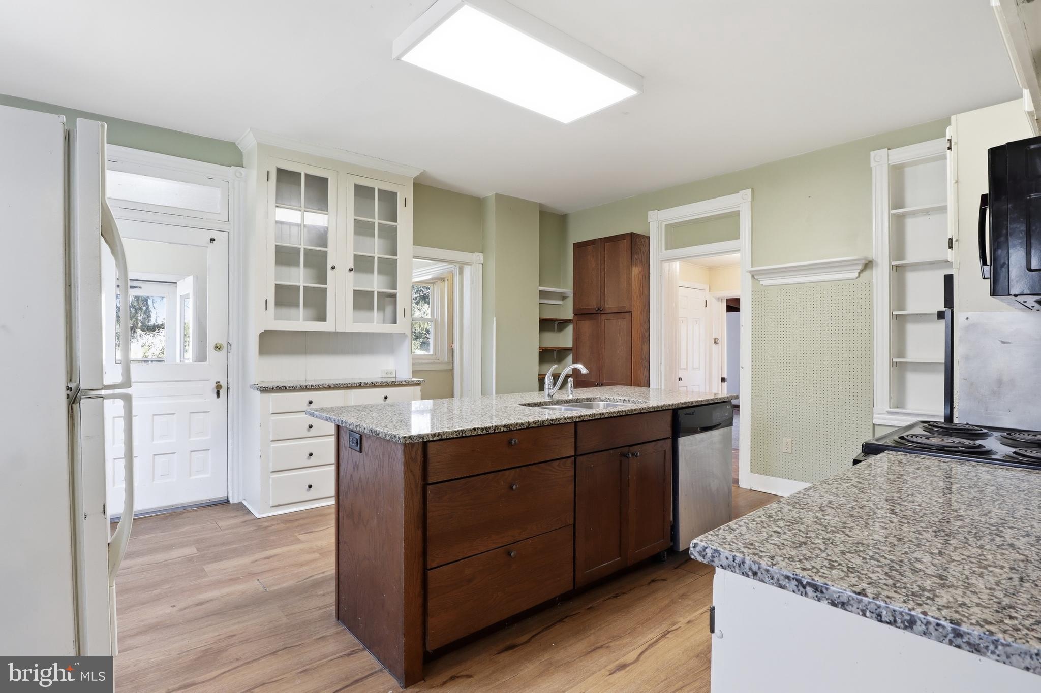 1545 Lititz Road Manheim, PA 17545 - Photo 8 of 66 a kitchen with stainless steel appliances granite countertop a sink stove and refrigerator