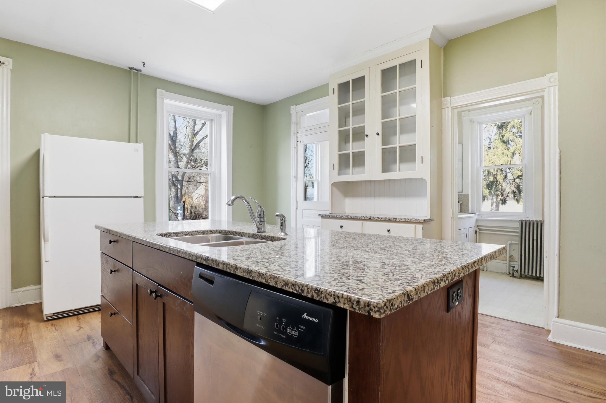 1545 Lititz Road Manheim, PA 17545 - Photo 10 of 66 a kitchen with granite countertop a sink and a refrigerator