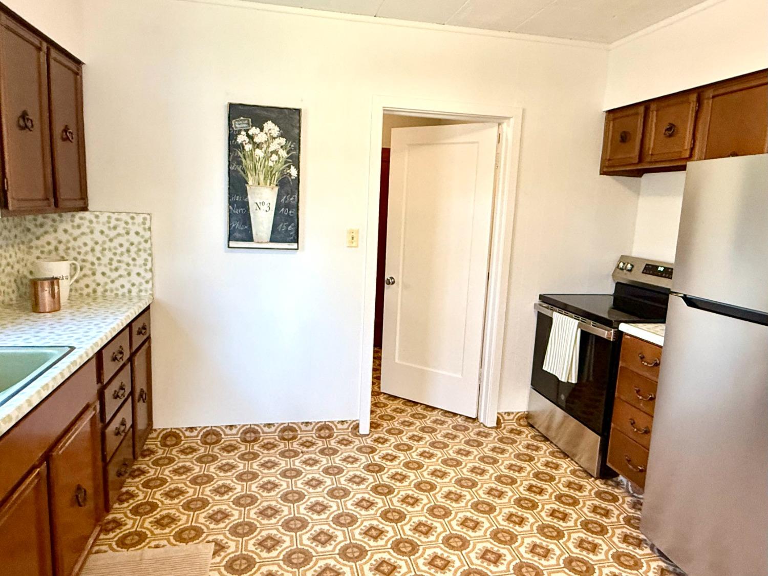 646 F Street Davis, CA 95616 - Photo 20 of 33 a bathroom with a sink and a mirror