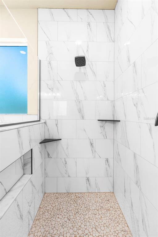 16143 Penn State Road Weeki Wachee, FL 34614 - Photo 25 of 45 a bathroom with a shower