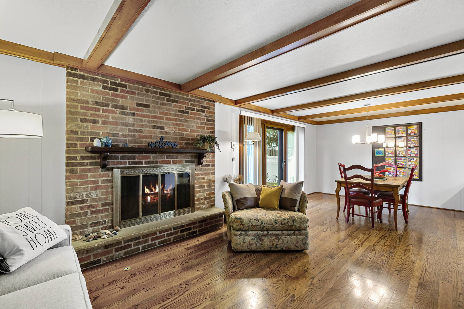 1841 Birch Road Northbrook, IL 60062 - Photo 2 of 18 a living room with furniture and a fireplace