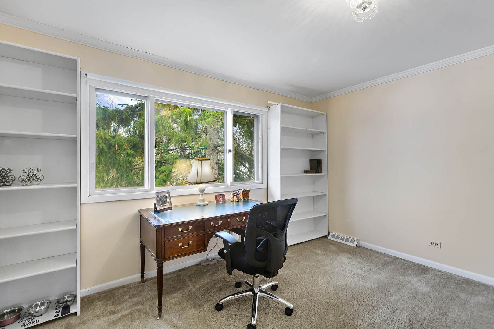 1841 Birch Road Northbrook, IL 60062 - Photo 12 of 18 a view of a workspace with furniture and a window