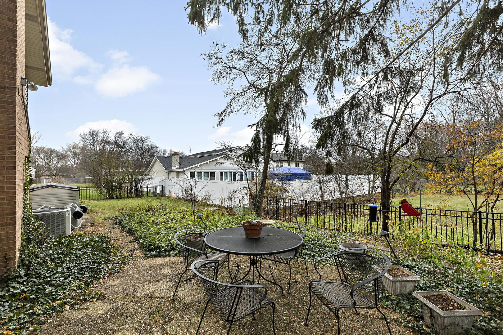 1841 Birch Road Northbrook, IL 60062 - Photo 17 of 18 a view of a chairs and table in backyard