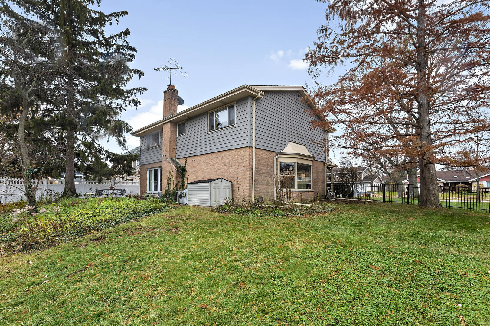 1841 Birch Road Northbrook, IL 60062 - Photo 18 of 18 a view of a house with a yard