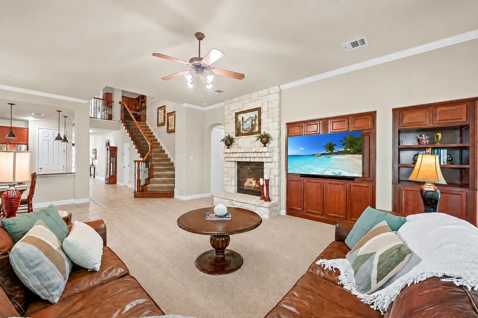 14608 Spillman Ranch Loop Austin, TX 78738 - Photo 7 of 31 a living room with furniture and a flat screen tv