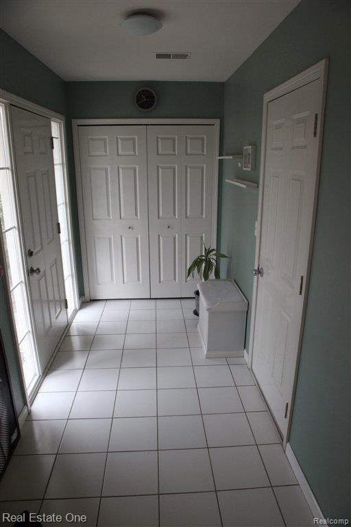 1968 Flagstone Circle, Unit 114 Rochester, MI 48307 - Photo 22 of 24 Lower Foyer