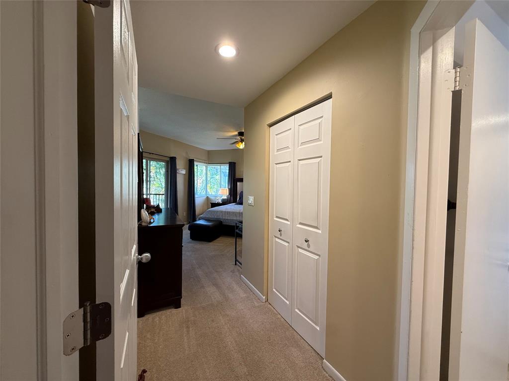 9237 Northwest 9th Place, Unit 9237 Plantation, FL 33324 - Photo 17 of 44 a view of a hallway with a livingroom and a bathroom