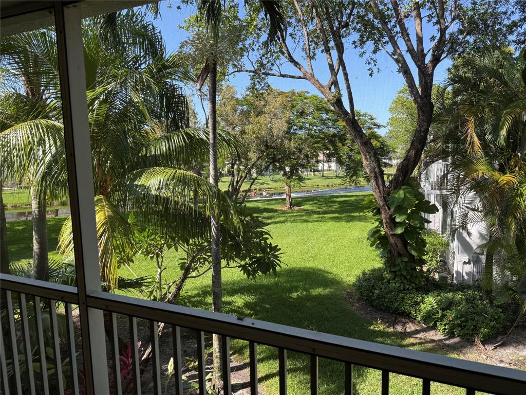 9237 Northwest 9th Place, Unit 9237 Plantation, FL 33324 - Photo 33 of 44 a view of lake from a balcony