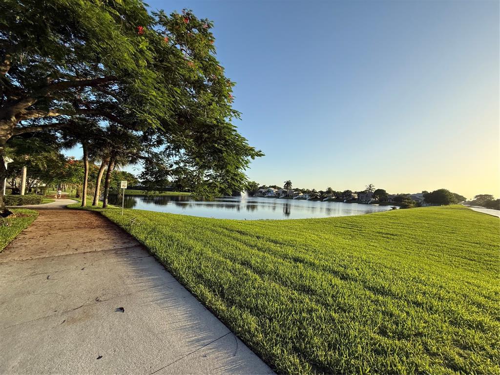 9237 Northwest 9th Place, Unit 9237 Plantation, FL 33324 - Photo 37 of 44 a view of outdoor space and yard