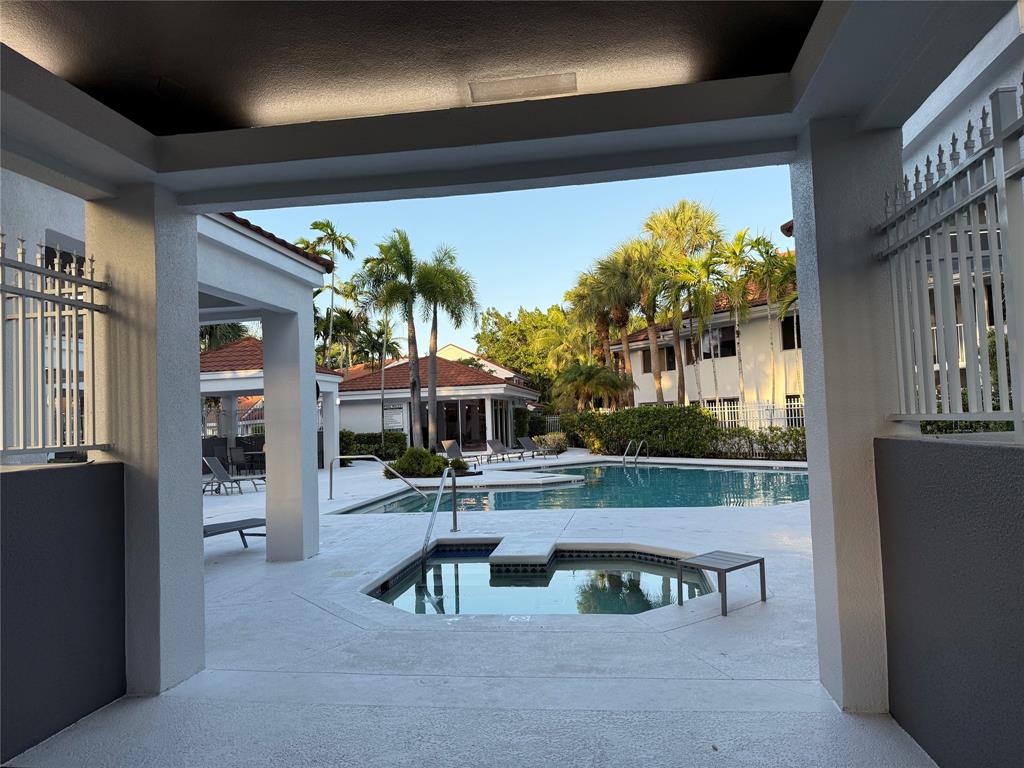 9237 Northwest 9th Place, Unit 9237 Plantation, FL 33324 - Photo 39 of 44 a living room with furniture and a potted plant