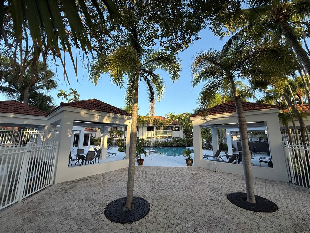 9237 Northwest 9th Place, Unit 9237 Plantation, FL 33324 - Photo 41 of 44 a outdoor space with lots of plants and palm trees