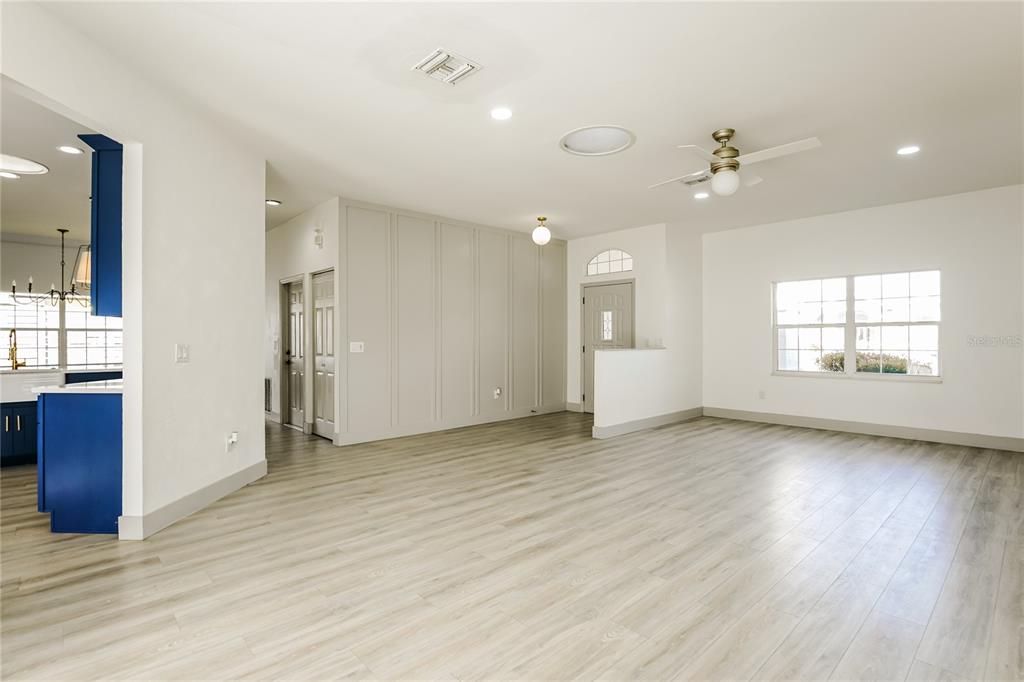71 Westcedar Lane Palm Coast, FL 32164 - Photo 2 of 20 a view of an empty room with window and wooden floor