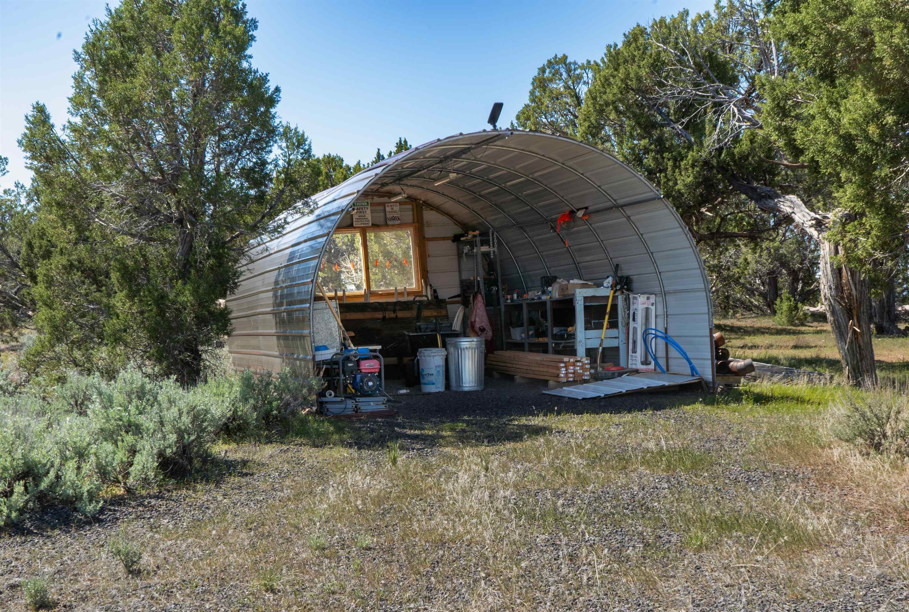 Tbd T Road De Beque, CO 81630 - Photo 15 of 25 a front view of a house with garden