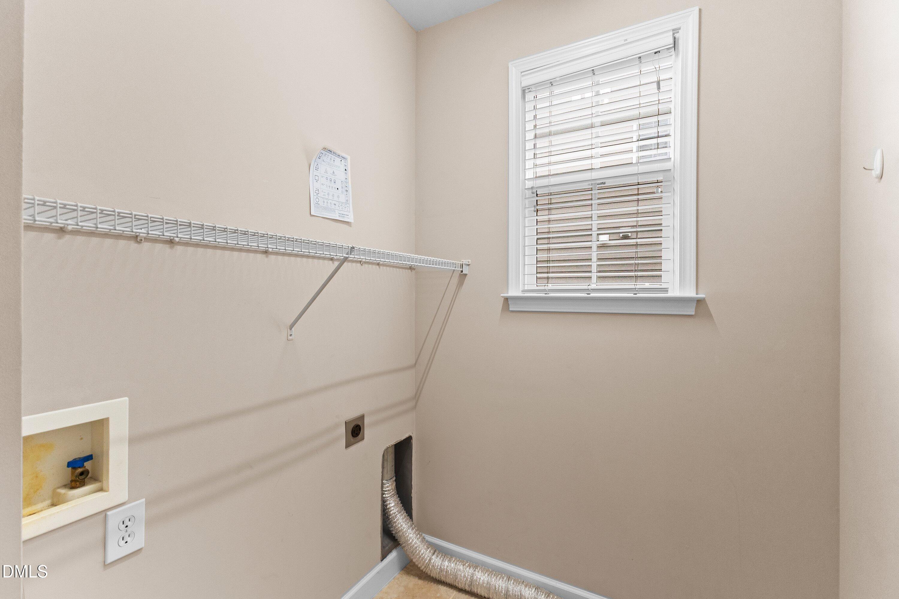 6001 Four Townes Lane Raleigh, NC 27616 - Photo 47 of 56 Main level laundry room!