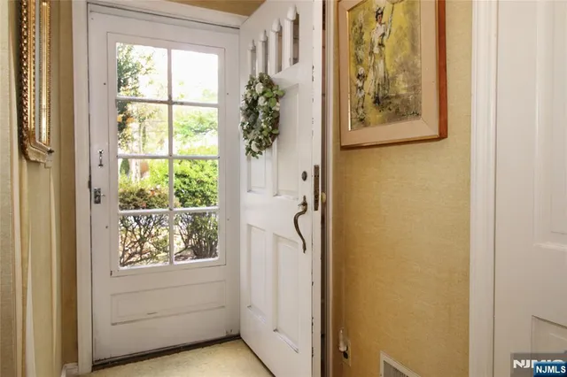 a bathroom with a shower and a window