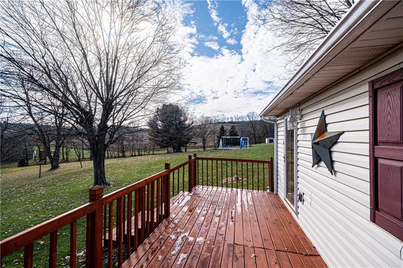 35 Kelly Road Washington, PA 15301 - Photo 21 of 25 Deck off of the Gameroom Amish constructed playset will stay with the home