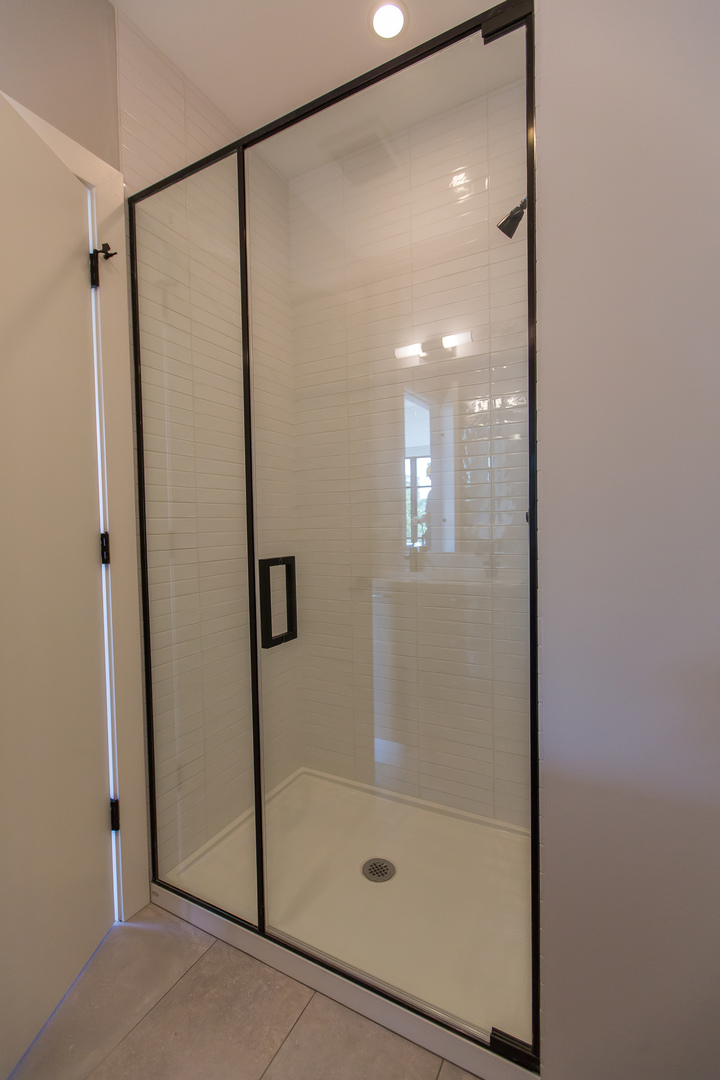 Undisclosed Address Chicago, IL 60610 - Photo 12 of 14 a bathroom with a glass shower door