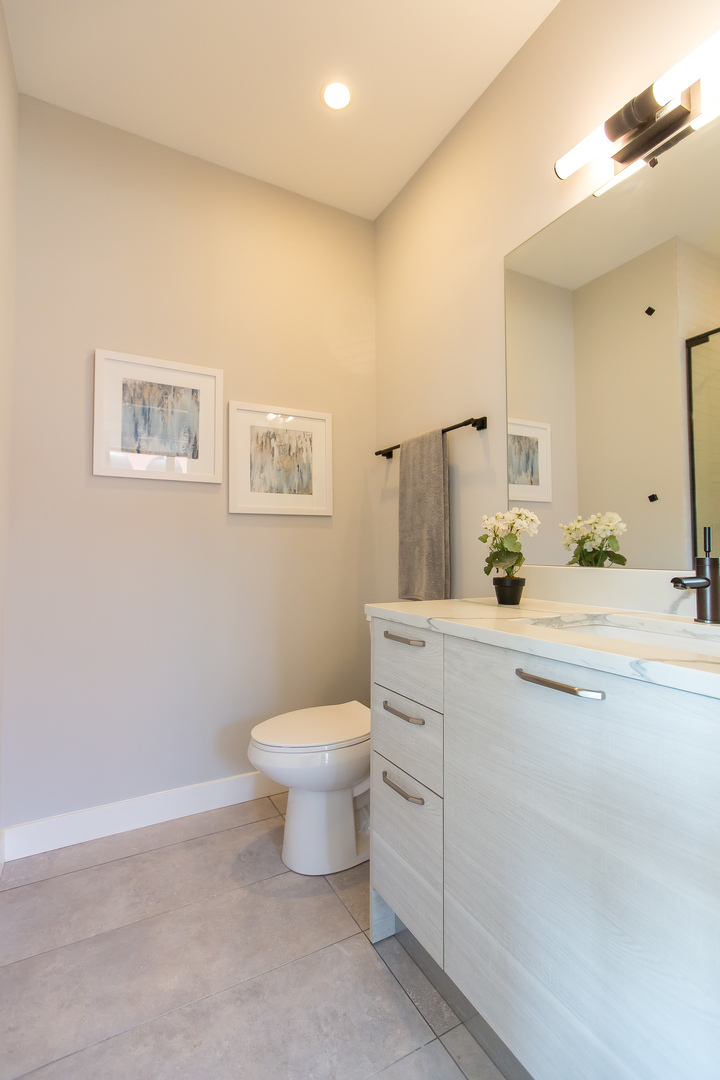 Undisclosed Address Chicago, IL 60610 - Photo 10 of 14 a bathroom with a toilet sink and mirror