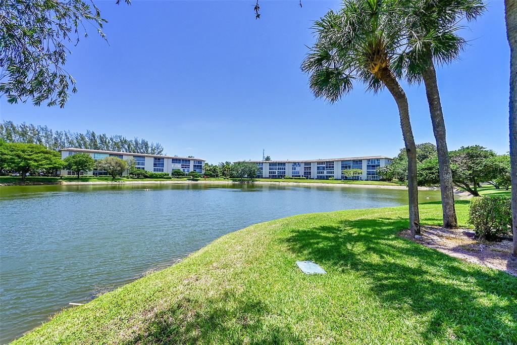 1902 Bermuda Circle, Unit H3 Coconut Creek, FL 33066 - Photo 24 of 25 a view of a lake with a city view