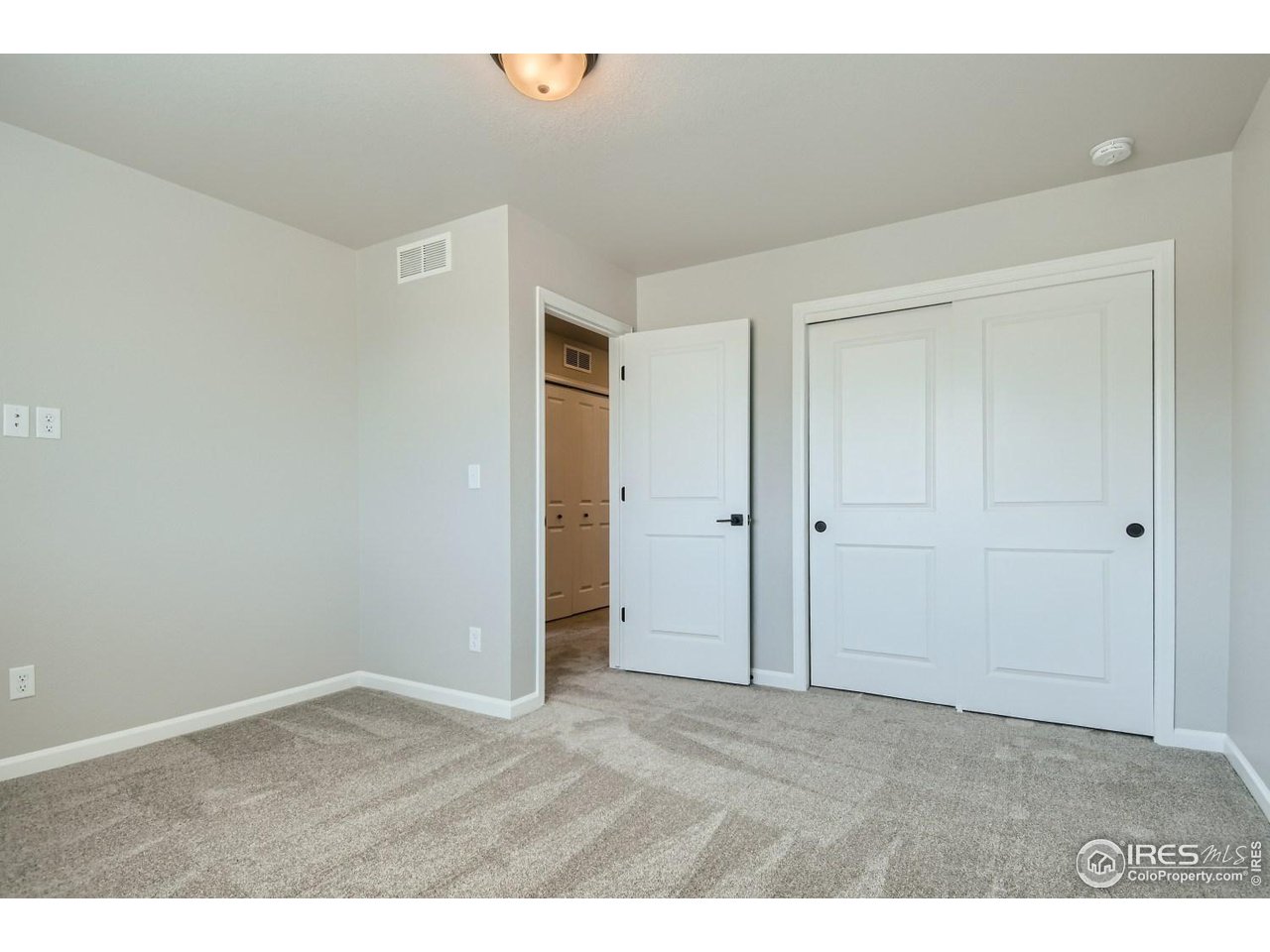 2540 Brookstone Drive, Unit B Milliken, CO 80543 - Photo 21 of 25 a view of an empty room