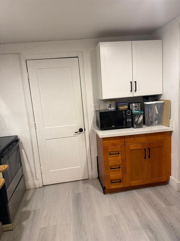 1116 West 32nd Street Riviera Beach, FL 33404 - Photo 8 of 12 a room with storage and utility