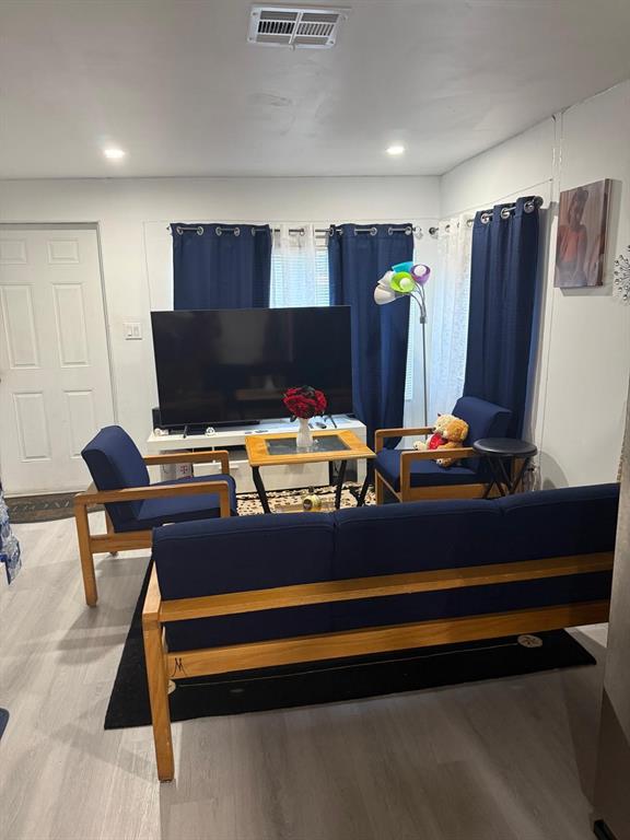 1116 West 32nd Street Riviera Beach, FL 33404 - Photo 10 of 12 a room with furniture and wooden floor