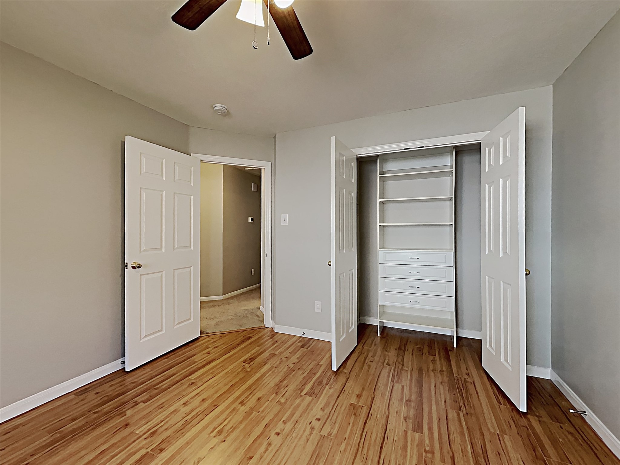85 Summer Lark Place Spring, TX 77382 - Photo 2 of 21 wooden floor in an empty room