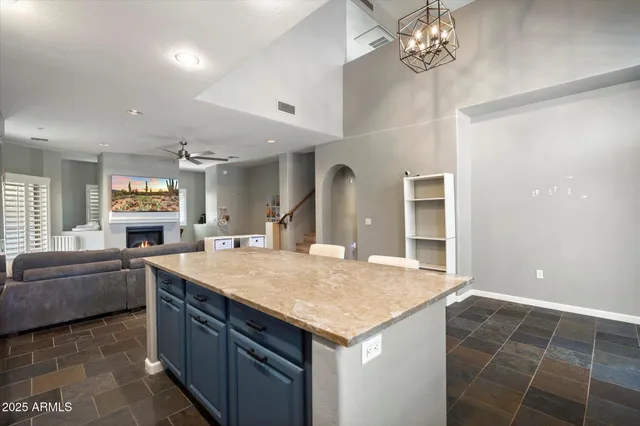 a kitchen with a sink cabinets and window