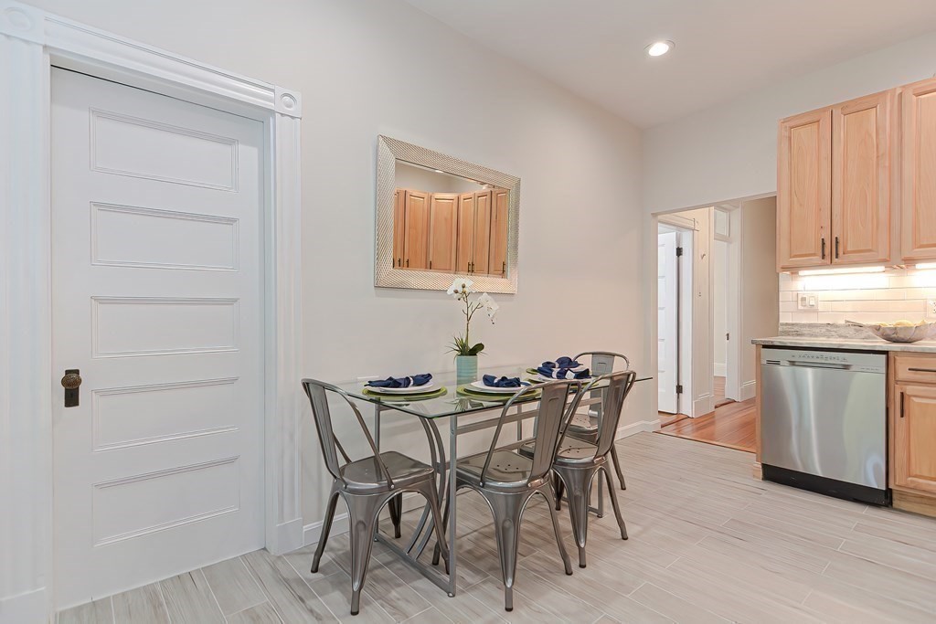 28 Inman Street, Unit 2 Cambridge, MA 02139 - Photo 9 of 24 a view of a dining room with furniture and window