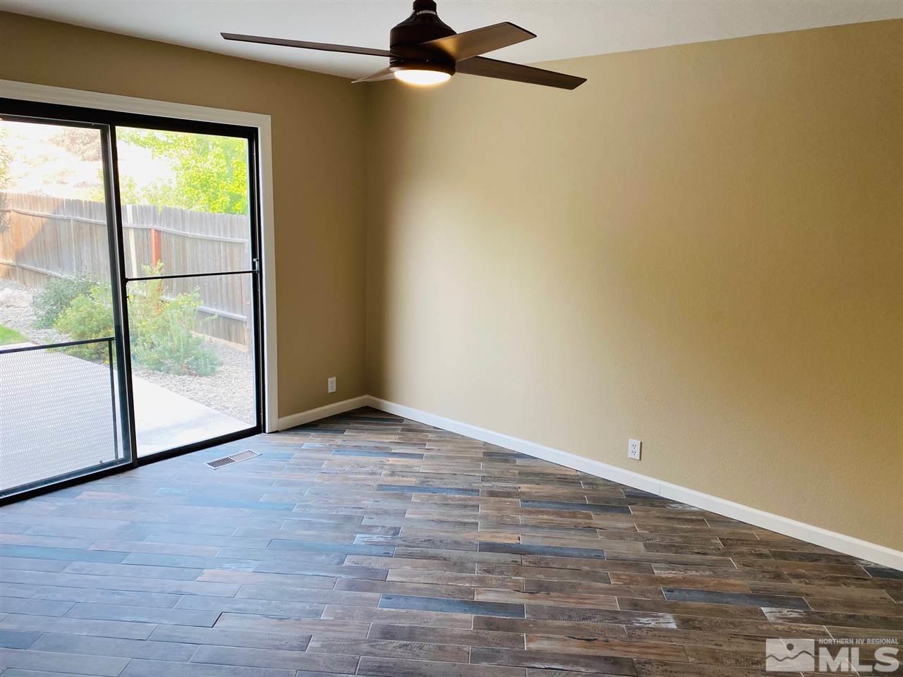 3899 Allen Glen Drive Reno, NV 89503 - Photo 6 of 13 a view of an empty room with a window